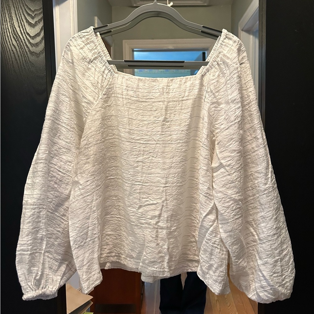 Ann Taylor white blouse with black stripes.